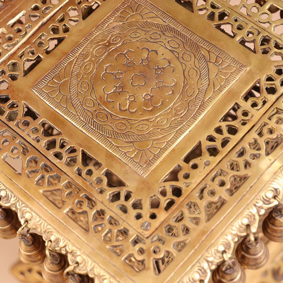 BRASS STOOL WITH FORTY HANGING BELLS