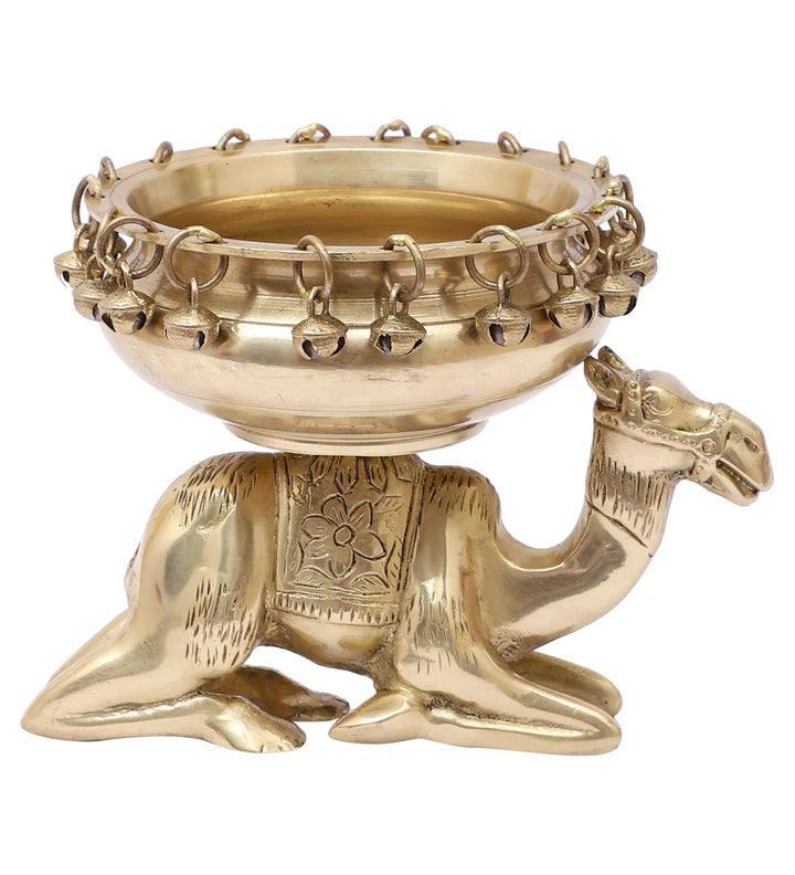 Brass Urli Bowl with Bells Sitting over Camel