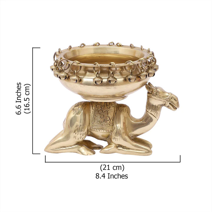 Brass Urli Bowl with Bells Sitting over Camel