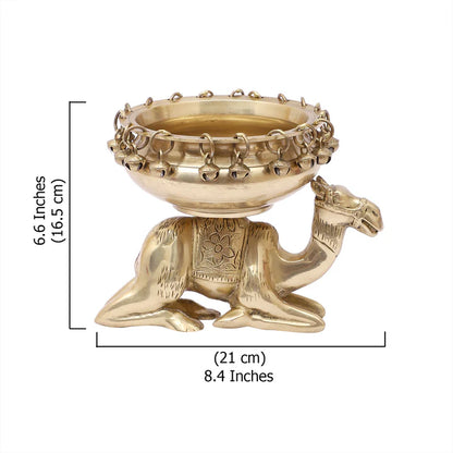 Brass Urli Bowl with Bells Sitting over Camel