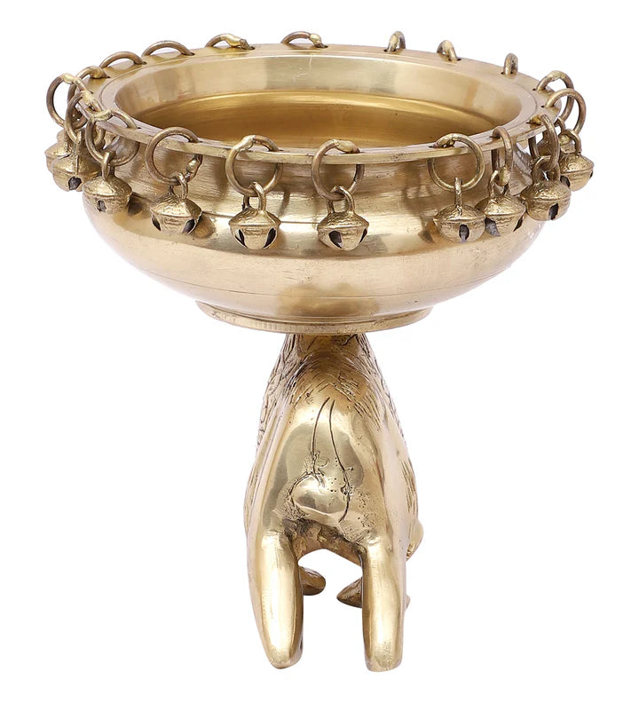 Brass Urli Bowl with Bells Sitting over Camel