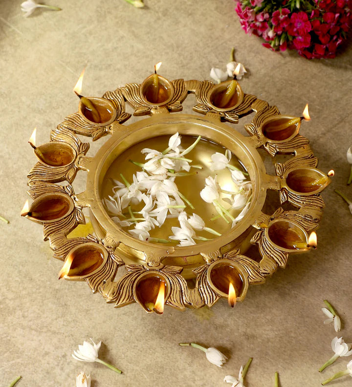 Brass Urli Bowl with 11 Lotus-shaped Diyas