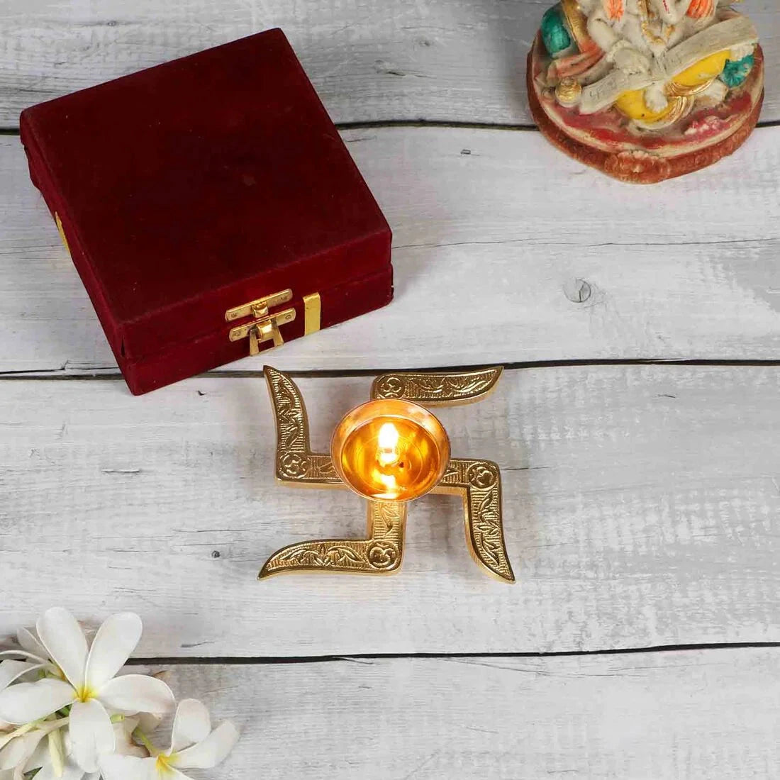 Golden Colored Swastik-shaped Aluminum Diya