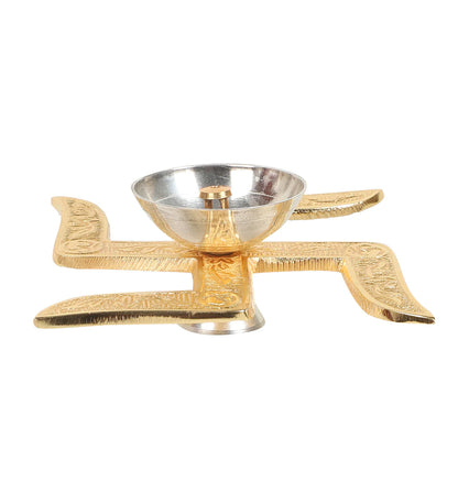 Golden Colored Swastik-shaped Aluminum Diya